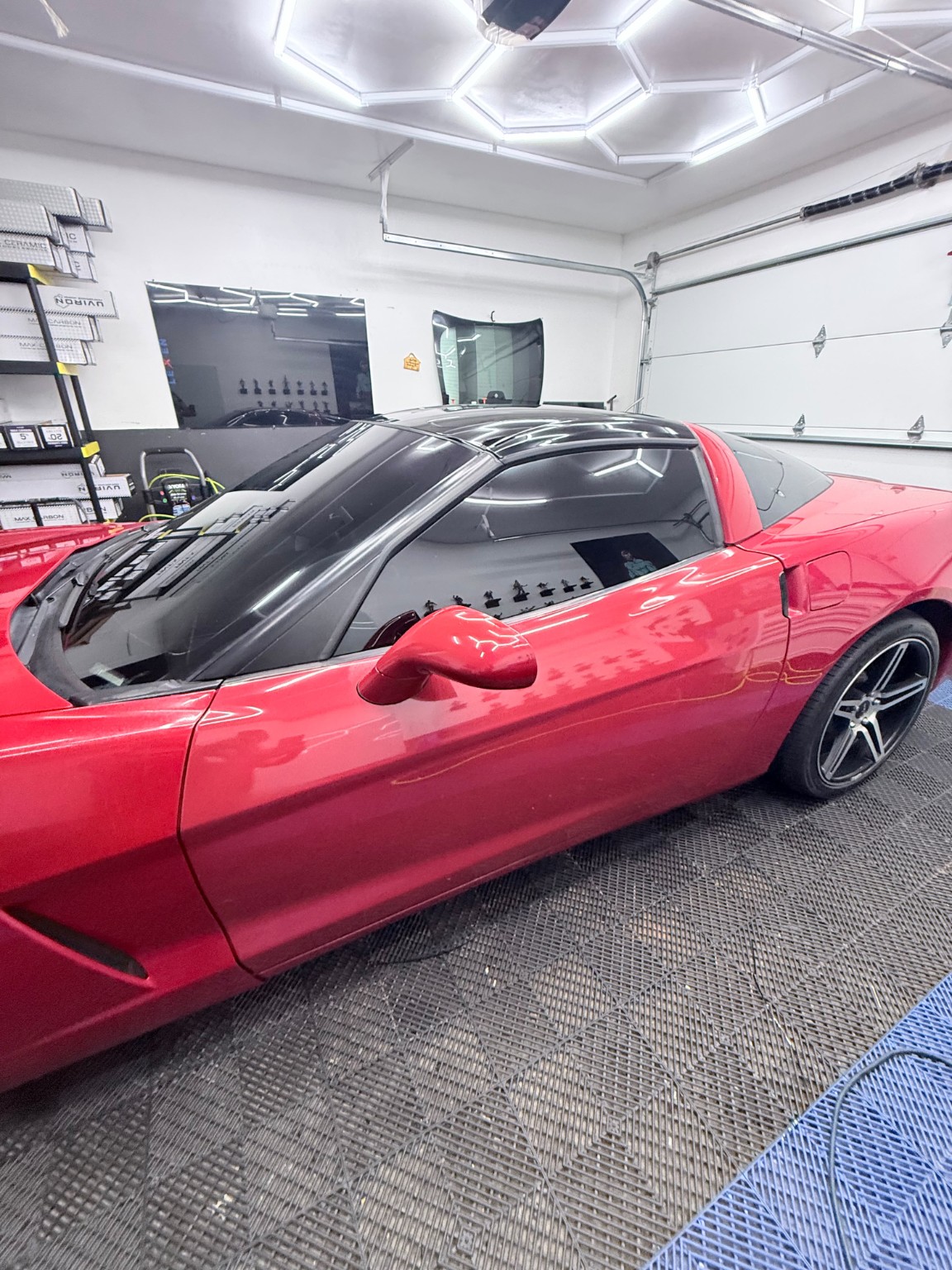 Red Corvette with dark window tint